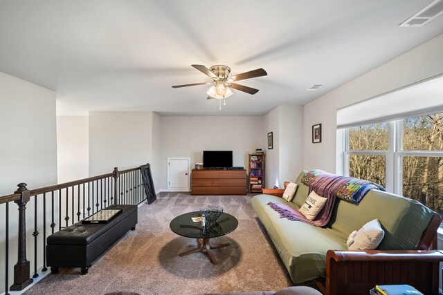 9475 Dunmoore Dr, Cumming, GA 30028 - living area featuring carpet flooring, ceiling fan, and visible vents