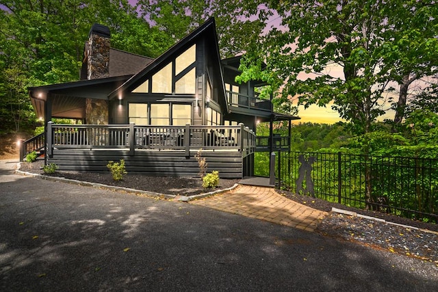 view of front of property with a balcony