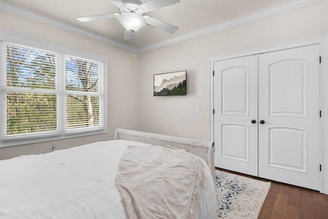 270 Milford Trl, Talking Rock, GA 30175 - bedroom with crown molding, a closet, ceiling fan, and dark wood finished floors