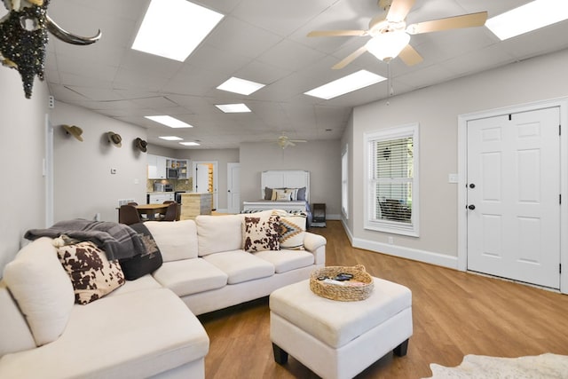 270 Milford Trl, Talking Rock, GA 30175 - living area featuring light wood-type flooring, a ceiling fan, and a paneled ceiling