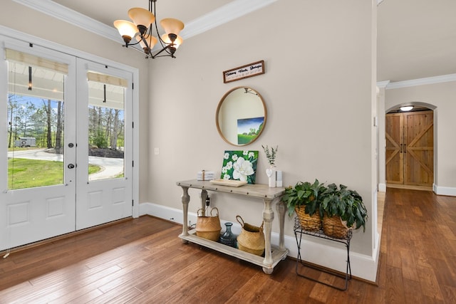 270 Milford Trl, Talking Rock, GA 30175 - entryway with crown molding, an inviting chandelier, arched walkways, french doors, and wood-type flooring