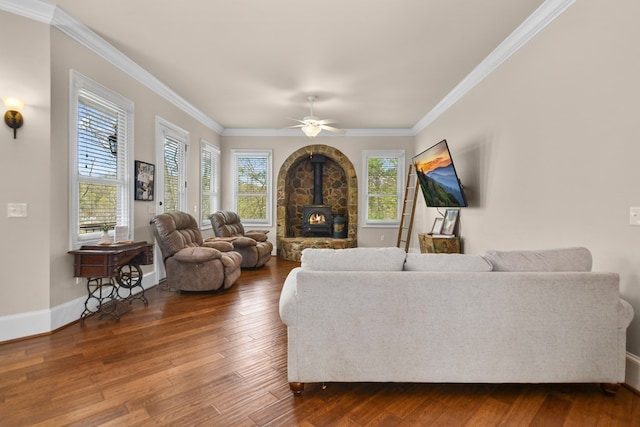 270 Milford Trl, Talking Rock, GA 30175 - living area featuring a ceiling fan, a wood stove, ornamental molding, and dark wood-style flooring