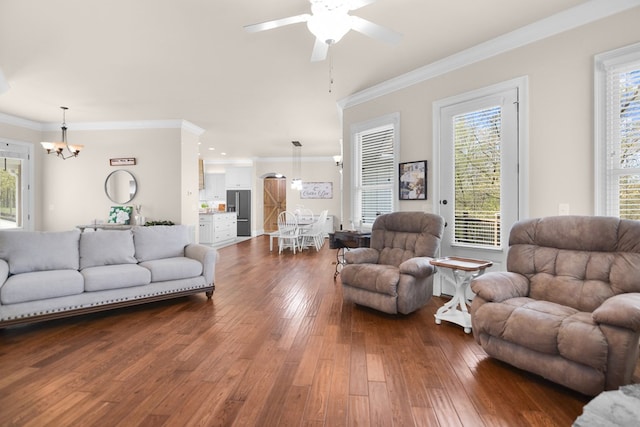 270 Milford Trl, Talking Rock, GA 30175 - living room featuring dark wood-style flooring, ceiling fan with notable chandelier, and ornamental molding