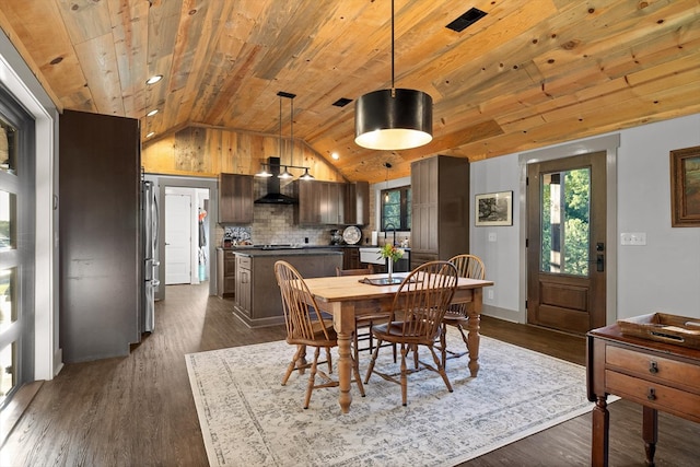1667 S Old Federal Rd, Chatsworth, GA 30705 - dining space featuring healthy amount of natural light, vaulted ceiling, wood ceiling, and dark wood-type flooring