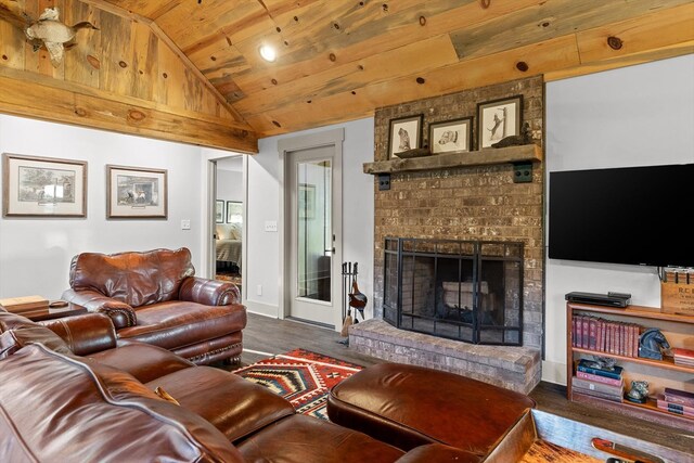 1667 S Old Federal Rd, Chatsworth, GA 30705 - living room with wooden ceiling, vaulted ceiling, wood finished floors, and a brick fireplace