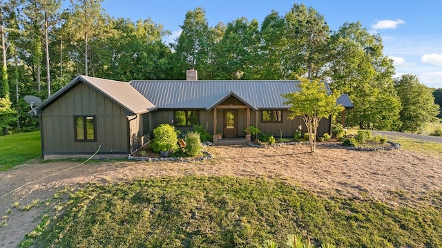 1667 S Old Federal Rd, Chatsworth, GA 30705 - view of front of house with a chimney, metal roof, and board and batten siding