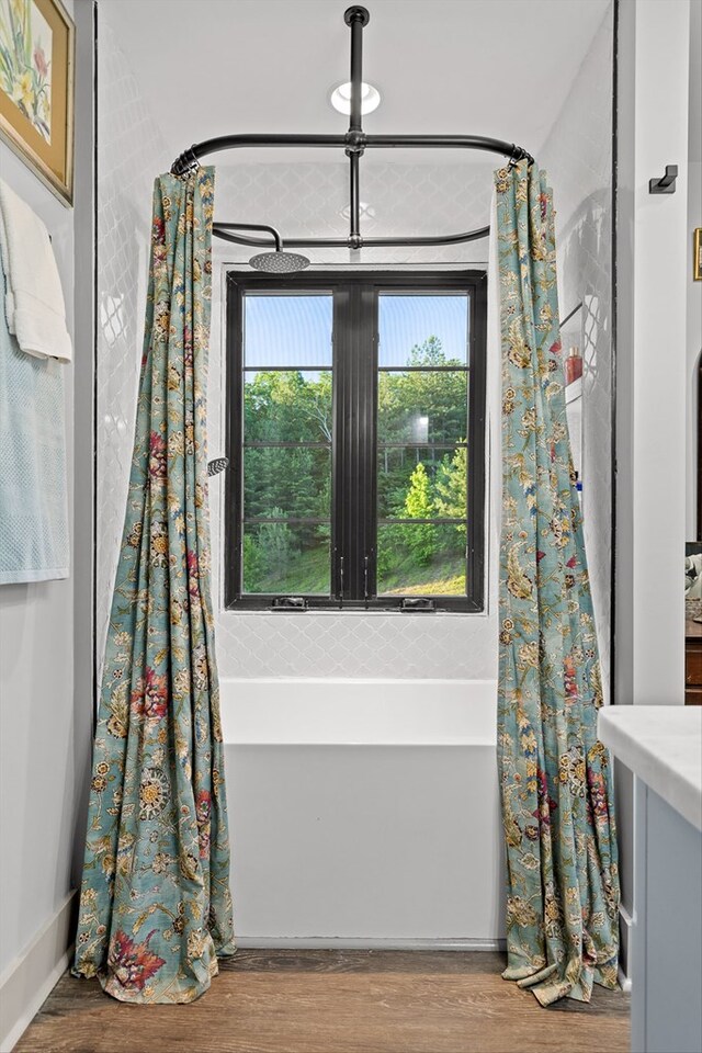 1667 S Old Federal Rd, Chatsworth, GA 30705 - bathroom with wood finished floors and a tub