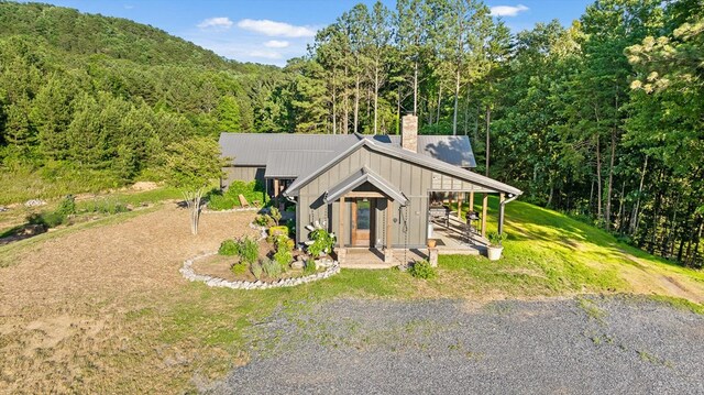 1667 S Old Federal Rd, Chatsworth, GA 30705 - view of front of property with a forest view, a chimney, and a front yard