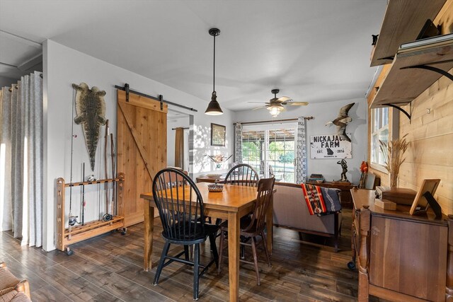 1667 S Old Federal Rd, Chatsworth, GA 30705 - dining space with a barn door, dark wood-type flooring, and a ceiling fan