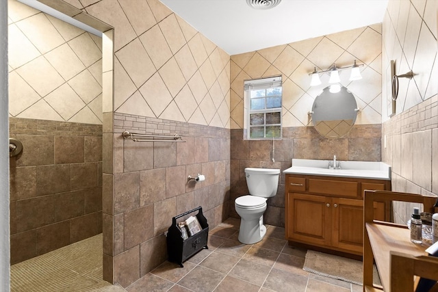 1667 S Old Federal Rd, Chatsworth, GA 30705 - full bath featuring tile walls, a walk in shower, vanity, and toilet