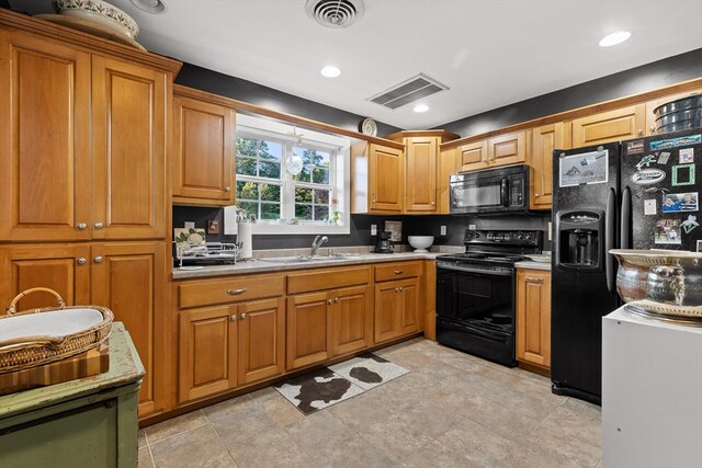 1667 S Old Federal Rd, Chatsworth, GA 30705 - kitchen featuring black appliances, a sink, brown cabinets, light countertops, and recessed lighting