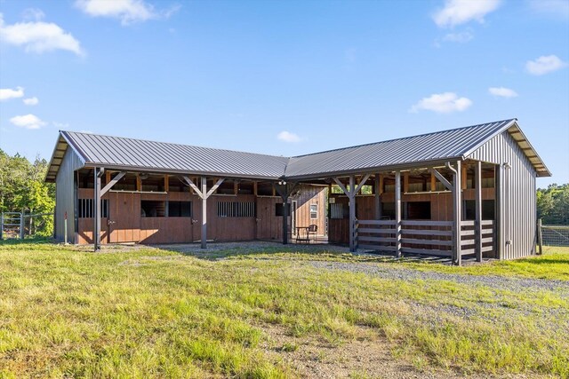 1667 S Old Federal Rd, Chatsworth, GA 30705 - back of property with an exterior structure, metal roof, a standing seam roof, and an outdoor structure