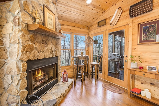 226 Shepherds Walk, Morganton, GA 30560 - living area featuring wood walls, vaulted ceiling, a fireplace, wood-type flooring, and wood ceiling