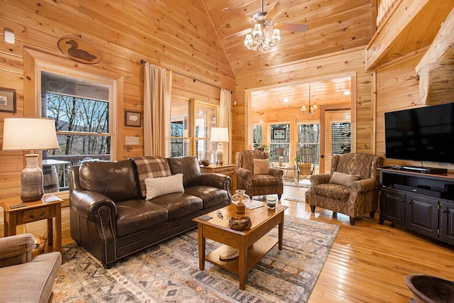226 Shepherds Walk, Morganton, GA 30560 - living area with wooden ceiling, ceiling fan with notable chandelier, wooden walls, high vaulted ceiling, and light wood-type flooring