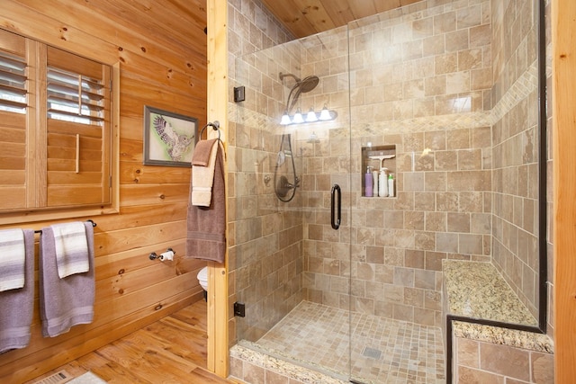 226 Shepherds Walk, Morganton, GA 30560 - full bath featuring toilet, wooden walls, wood finished floors, and a stall shower