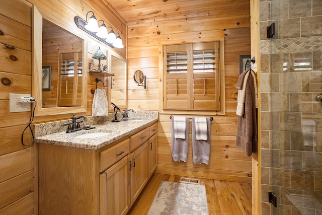226 Shepherds Walk, Morganton, GA 30560 - bathroom featuring double vanity, visible vents, a sink, and wood finished floors