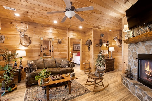 226 Shepherds Walk, Morganton, GA 30560 - living room with a ceiling fan, visible vents, wood ceiling, wood finished floors, and a fireplace