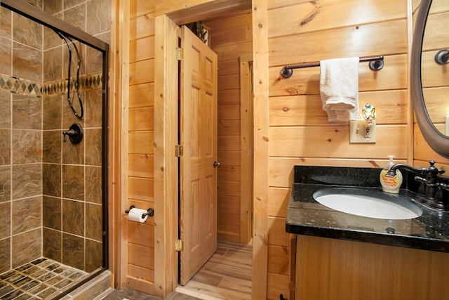 226 Shepherds Walk, Morganton, GA 30560 - bathroom featuring a shower stall, wood walls, and vanity