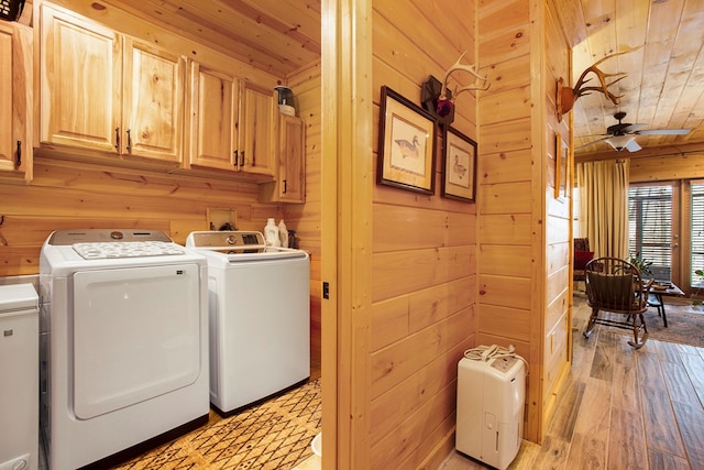 226 Shepherds Walk, Morganton, GA 30560 - laundry area with washer and clothes dryer, cabinet space, light wood-type flooring, wooden walls, and wood ceiling