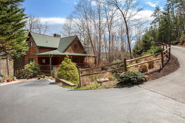 226 Shepherds Walk, Morganton, GA 30560 - view of side of home with a chimney, a porch, and roof with shingles