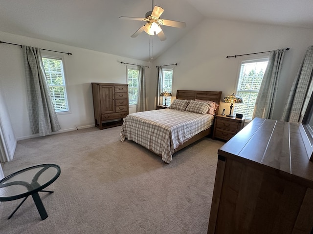 bedroom featuring light colored carpet, high vaulted ceiling, and ceiling fan