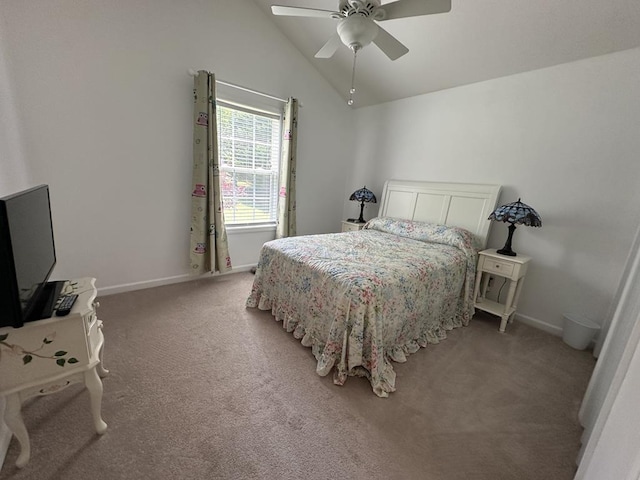 carpeted bedroom featuring ceiling fan and vaulted ceiling