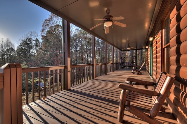 wooden deck with ceiling fan