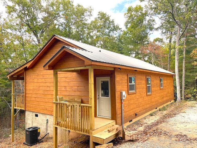 exterior space featuring central air condition unit