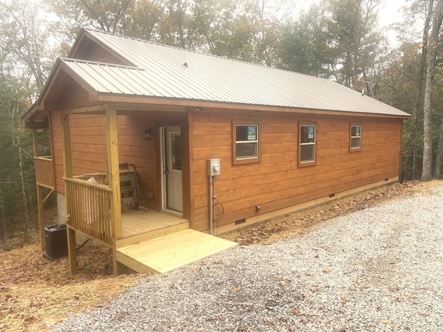 exterior space featuring a wooden deck