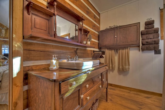 4011 Murphy Hwy, Mineral Bluff, GA 30559 - kitchen featuring a sink, light wood finished floors, and baseboards