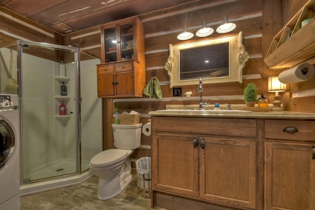4011 Murphy Hwy, Mineral Bluff, GA 30559 - bathroom with washer / dryer, a stall shower, toilet, vanity, and wooden walls