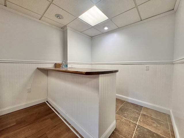 spacious closet with a drop ceiling