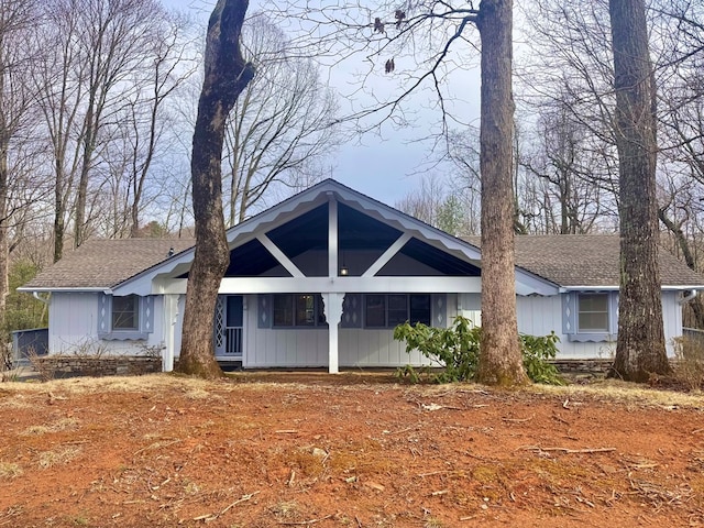 view of front of house featuring a shingled roof