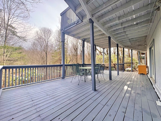 wooden deck with outdoor dining area