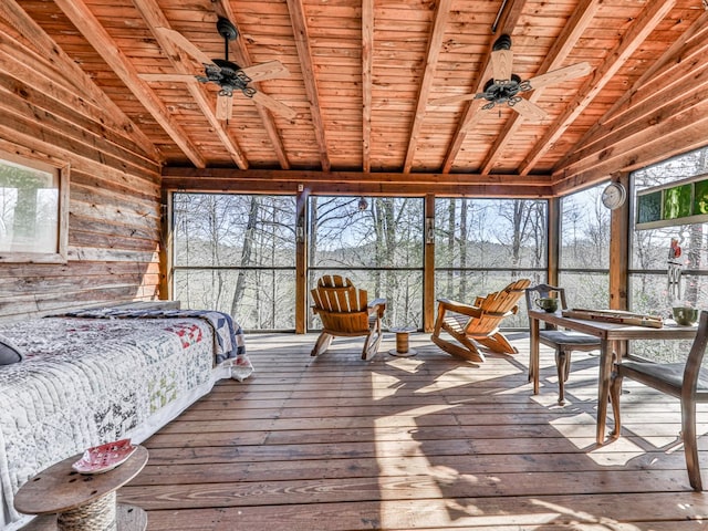 interior space with hardwood / wood-style floors, wooden walls, vaulted ceiling with beams, and wooden ceiling