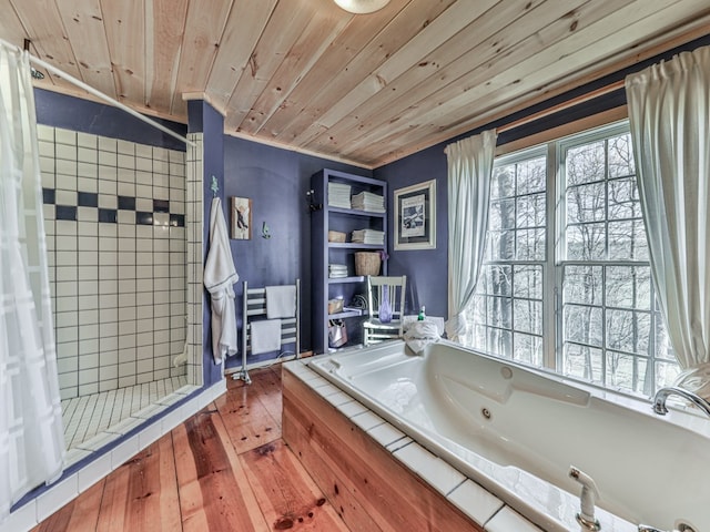 bathroom with a stall shower, wood ceiling, wood-type flooring, and a whirlpool tub