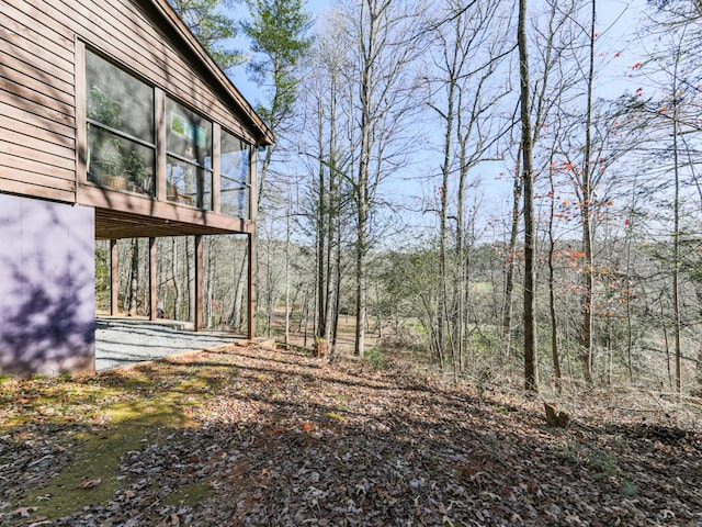 view of yard with a sunroom