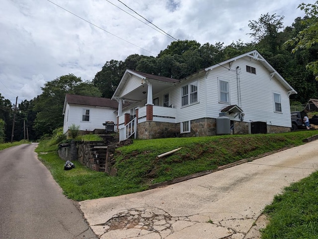 view of front of house with central AC unit