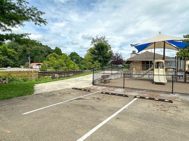 view of play area featuring fence