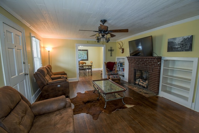 living area featuring baseboards, wooden ceiling, wood finished floors, crown molding, and a fireplace