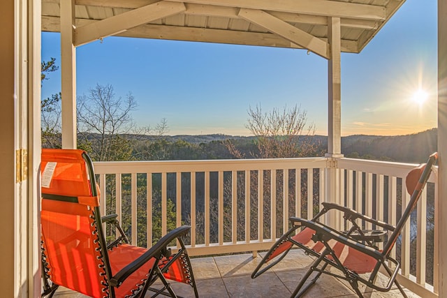 view of balcony at dusk