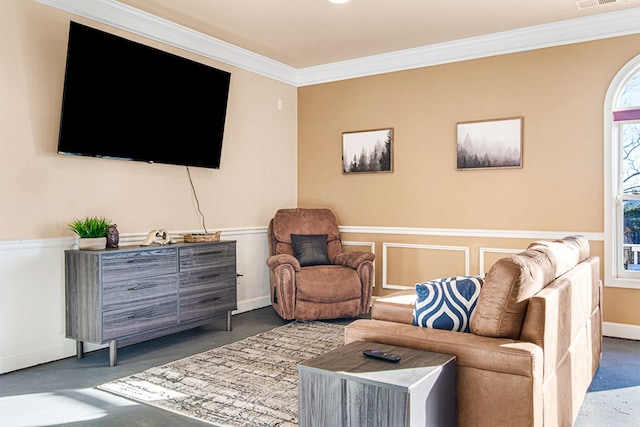 living room featuring crown molding