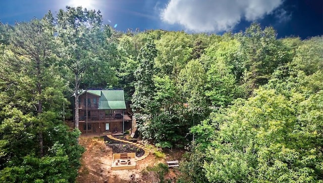 587 Lower Prince Mountain Rd, Cherry Log, GA 30522 - view of subject property with a heavily wooded area