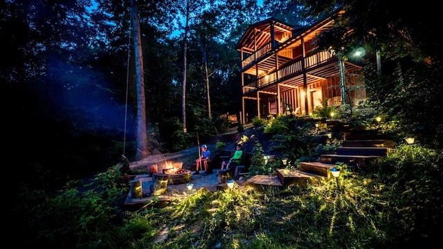 587 Lower Prince Mountain Rd, Cherry Log, GA 30522 - back of house featuring an outdoor fire pit, stairs, and a deck