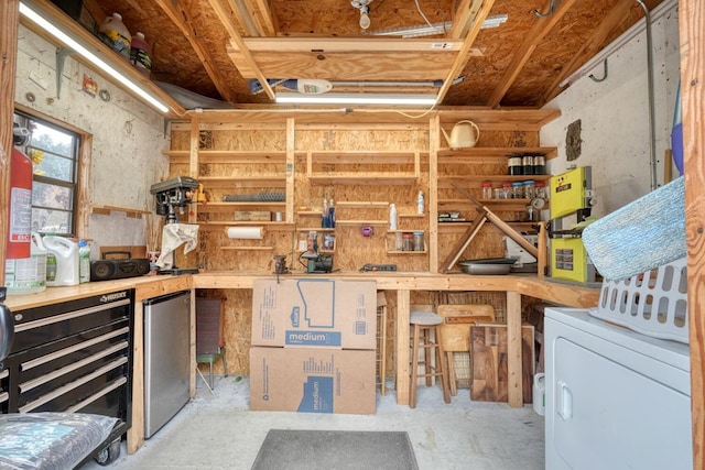 storage area featuring washer / dryer