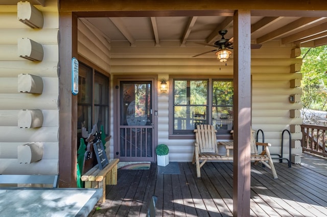 exterior space with ceiling fan