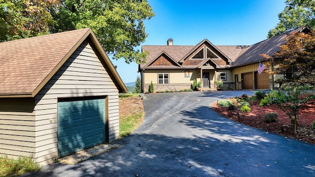 craftsman house with a garage