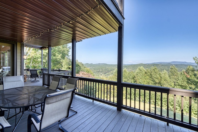 wooden terrace featuring a mountain view