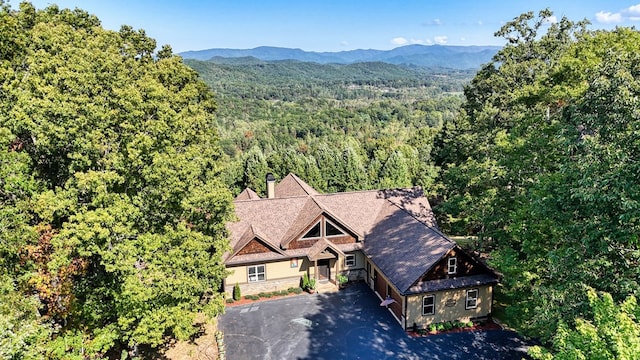 drone / aerial view featuring a mountain view