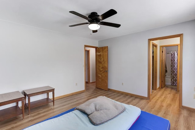 bedroom featuring light hardwood / wood-style floors and ceiling fan